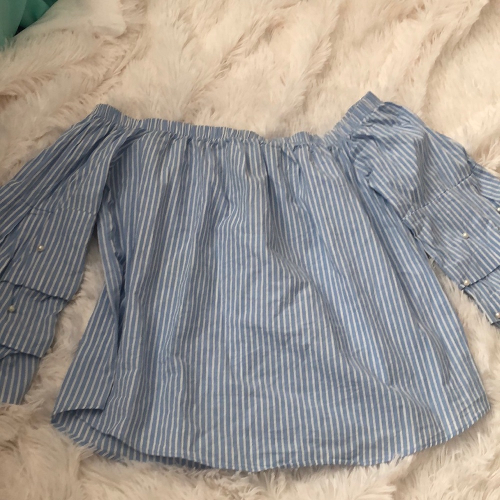 Blue and white striped shirt.